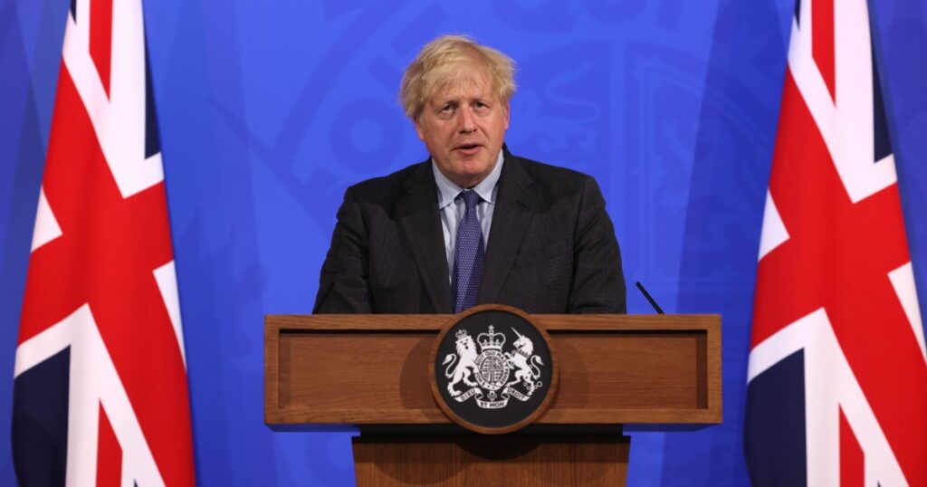 UK Prime Minister Boris Johnson speaks during a COVID-19 pandemic virtual press conference inside the Downing Street Briefing Room on June 14, 2021 in London [File: WPA Pool/Getty Images]