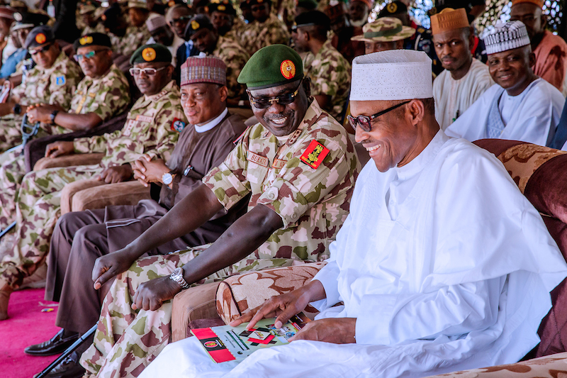 Buhari and former Chief of Army Staff, Tukur Buratai during an event/The Bridge News