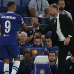 Aubameyang and Potter exchange pleasantries during a game/Football365