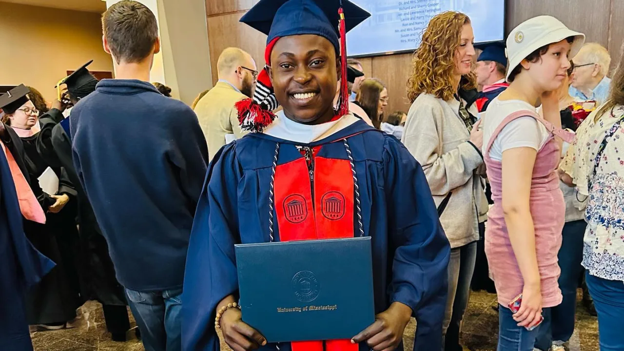 Odinakachukwu Ezeh poses for a picture during graduation/Instagram @odinakachukwu_ezeh