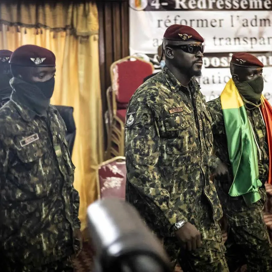 Guinean Military Head of State Colonel Mamady Doumbouya surrounded by soldiers