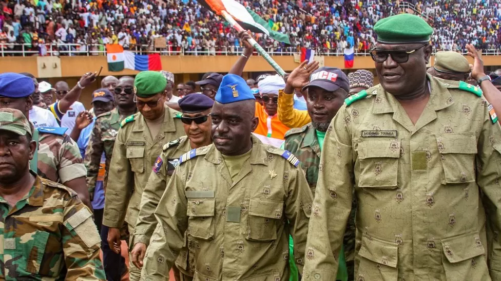 Coup leaders in Niger cheered by thousands of supporters during a rally on Sunday/Reuters