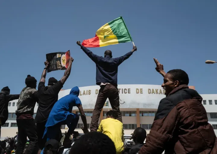 Citizens took to the streets to protest President Sall's decision to postpone the presidential election/AP