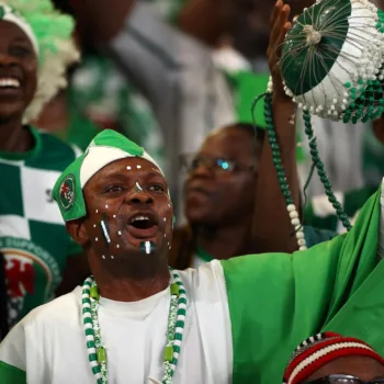 A Nigerian fan celebrates at the AFCON in Cote d'Ivoire/CAF
