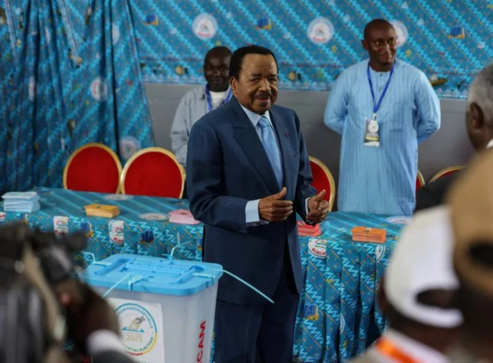President Paul Biya after casting his vote/Reuters