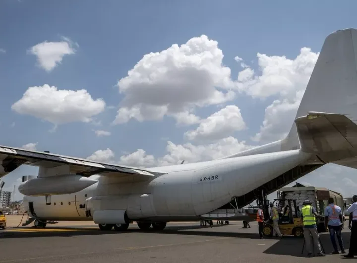 Here's a rephrased version: On Monday, June 9, 2025, workers prepare a Fogbow aid aircraft at Juba airport in South Sudan for food airdrop missions over the Upper Nile region/AP