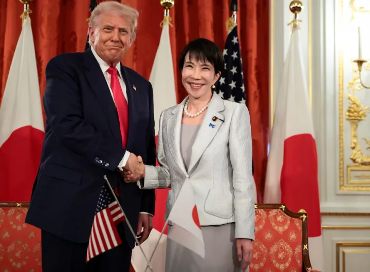 Japanese Prime Minister Sanae Takaichi and U.S. President Donald Trump exchange a handshake at their bilateral meeting held at Akasaka Palace in Tokyo, Japan on October 28, 2025. REUTERS/Evelyn Hockstein