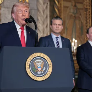 President Donald Trump discusses the Navy's "Golden Fleet" initiative at his Mar-a-Lago estate in Palm Beach, Florida, on December 22, 2025, while Defense Secretary Pete Hegseth and Navy Secretary John Phelan look on. REUTERS/Jessica Koscielniak