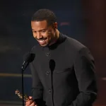Michael B. Jordan receives his Best Actor Award at the Oscars 2026/Getty
