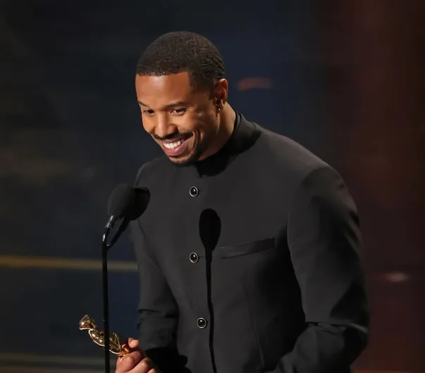 Michael B. Jordan receives his Best Actor Award at the Oscars 2026/Getty