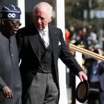 King Charles III of Britain receives President Bola Ahmed Tinubu at a welcome ceremony held on the Royal Dais at Datchet Road, Windsor, as part of Tinubu's two-day state visit. March 18, 2026. Photo: Isabel Infantes/Pool/REUTERS