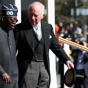 King Charles III of Britain receives President Bola Ahmed Tinubu at a welcome ceremony held on the Royal Dais at Datchet Road, Windsor, as part of Tinubu's two-day state visit. March 18, 2026. Photo: Isabel Infantes/Pool/REUTERS