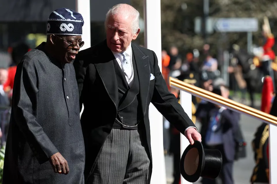 King Charles III of Britain receives President Bola Ahmed Tinubu at a welcome ceremony held on the Royal Dais at Datchet Road, Windsor, as part of Tinubu's two-day state visit. March 18, 2026. Photo: Isabel Infantes/Pool/REUTERS