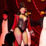 Megan Thee Stallion dazzles crowds as she makes her debut on the opening night of Moulin Rouge! The Musical, held on 24 March/Getty Images