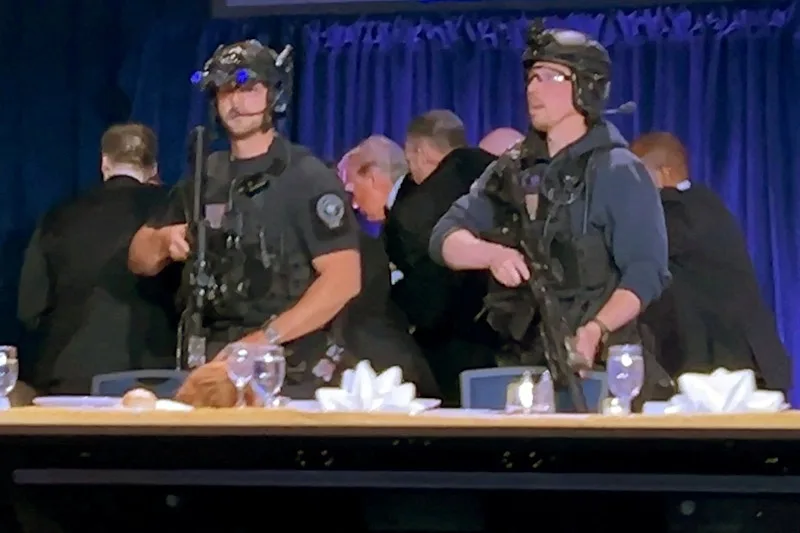 A still image captured from video footage on April 25, 2026, shows Trump being escorted out. (Image credit: REUTERS/Bo Erickson)