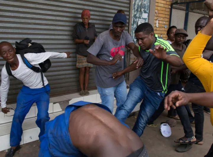 Xenophobic mob attacks a Nigerian in South Africa/Photo: Reuters