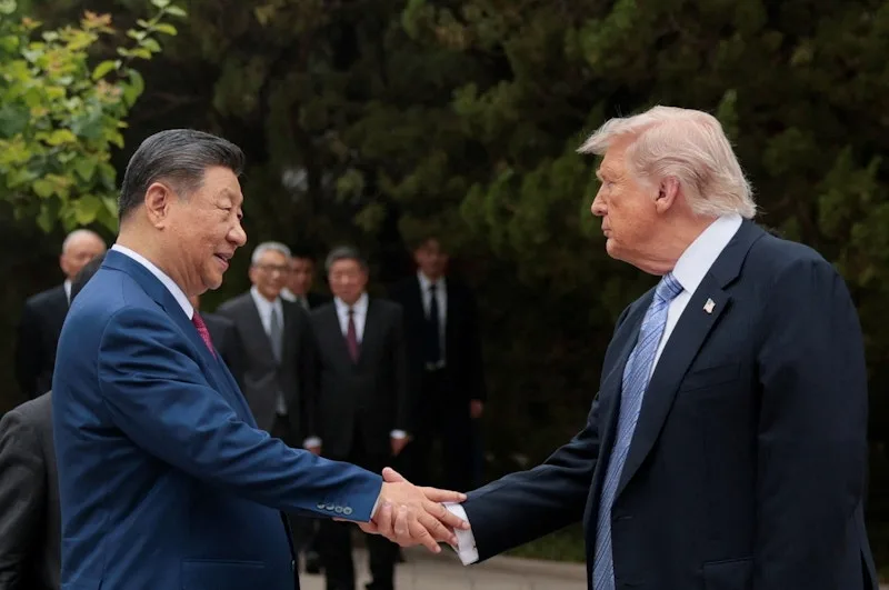 U.S. President Donald Trump and Chinese President Xi Jinping pictured at the Zhongnanhai Garden compound in Beijing on May 15, 2026. Photo: REUTERS/Evan Vucci/Pool