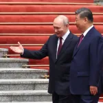 Russian President Vladimir Putin and China's President Xi Jinping are pictured together during a welcoming ceremony held at the Great Hall of the People in Beijing on Wednesday. [Maxim Shemetov/Pool/Reuters]