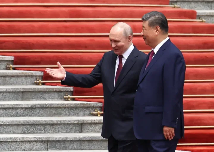 Russian President Vladimir Putin and China's President Xi Jinping are pictured together during a welcoming ceremony held at the Great Hall of the People in Beijing on Wednesday. [Maxim Shemetov/Pool/Reuters]