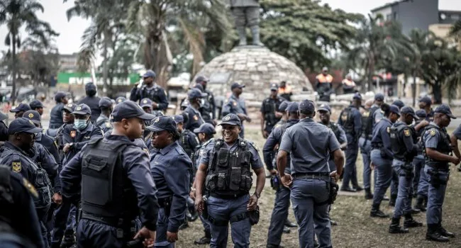 Members of the South African Police Service (SAPS) assemble in Durban on June 30, 2026, ahead of planned protests organized by the March and March movement targeting the presence of undocumented migrants in the country/AP