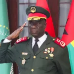 Major-General Horta Inta-a, Guinea-Bissau's new transitional president, offers a salute during the ceremony marking Major-General Tomas Djassi's swearing-in as the new Armed Forces chief of staff, held in Bissau on November 27, 2025. Photo: REUTERS/Delcyo Sanca