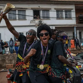 Cameroonian players celebrate during the trophy parade/Photo: Getty