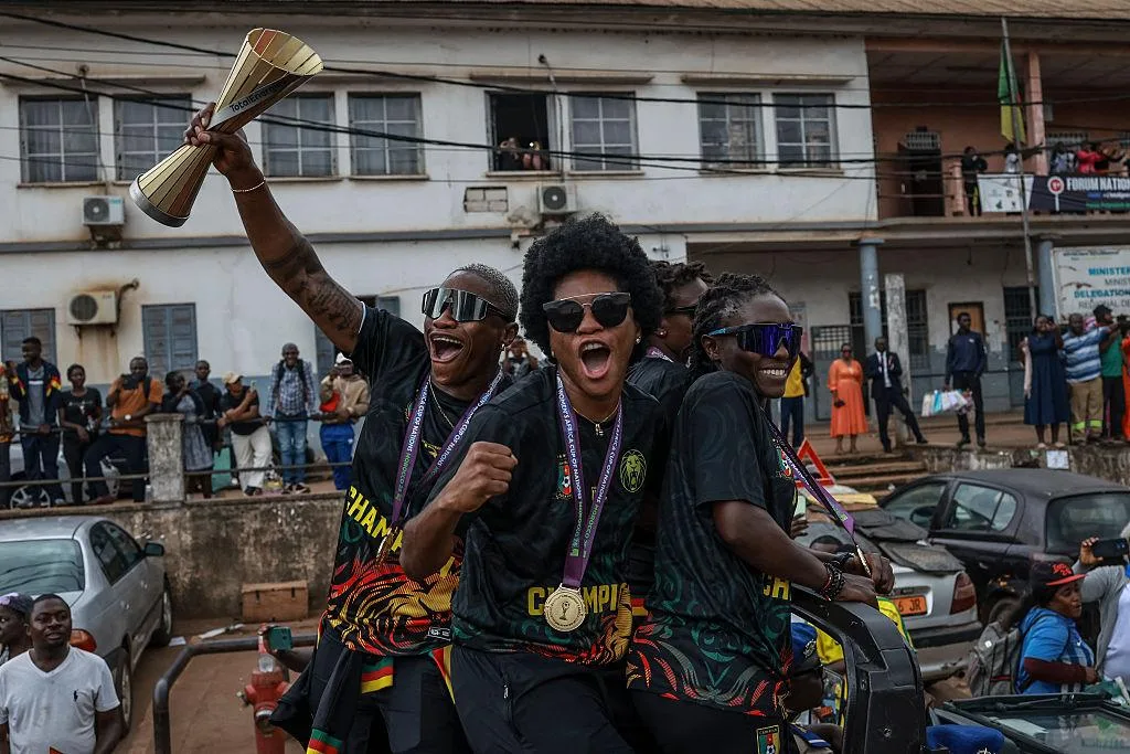 Cameroonian players celebrate during the trophy parade/Photo: Getty