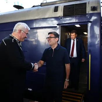 Britain's Prime Minister Andy Burnham is welcomed by Ukraine's Foreign Affairs Minister Andrii Sybiha as he arrives by train in Kyiv on August 24, 2026, the day Ukraine marks the 35th anniversary of its independence. HENRY NICHOLLS/Pool via REUTERS