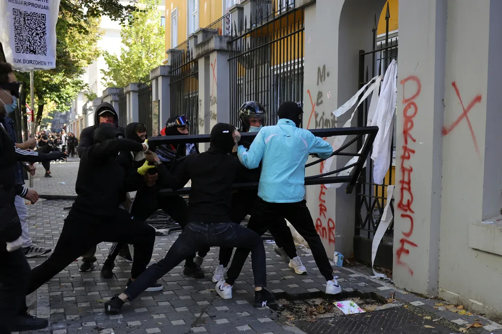 Fury on the streets of Tirana, Albania: Protesters shattered the Education Ministry’s windows, flattened its perimeter fence and set billboards ablaze as unrest gripped the Albanian capital. [Hameraldi Agolli/AP Photo]