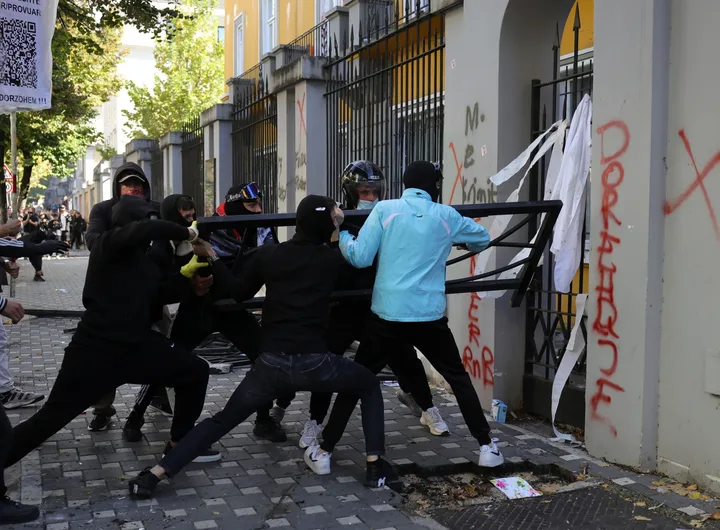 Fury on the streets of Tirana, Albania: Protesters shattered the Education Ministry’s windows, flattened its perimeter fence and set billboards ablaze as unrest gripped the Albanian capital. [Hameraldi Agolli/AP Photo]