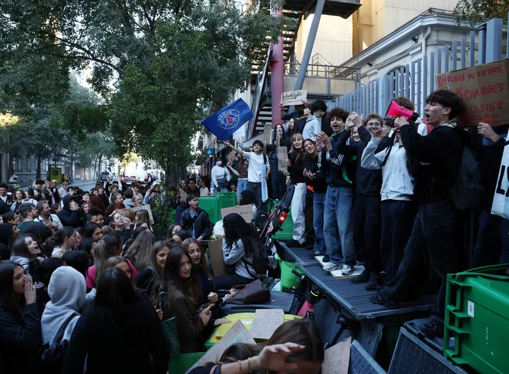 French high school students gathered outside Lycée Charles Péguy in Paris on October 6, 2026, joining a nationwide day of protests and blockades. They voiced anger over overcrowded classrooms, teacher shortages and run-down school buildings, problems they blame on years of underinvestment. REUTERS/Tom Nicholson